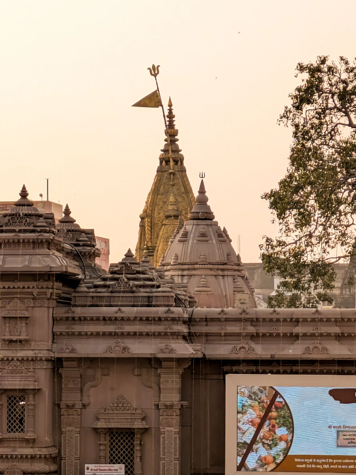 Golden spire of Kashi Vishwanath Temple in Varanasi seen from the corridor walkway