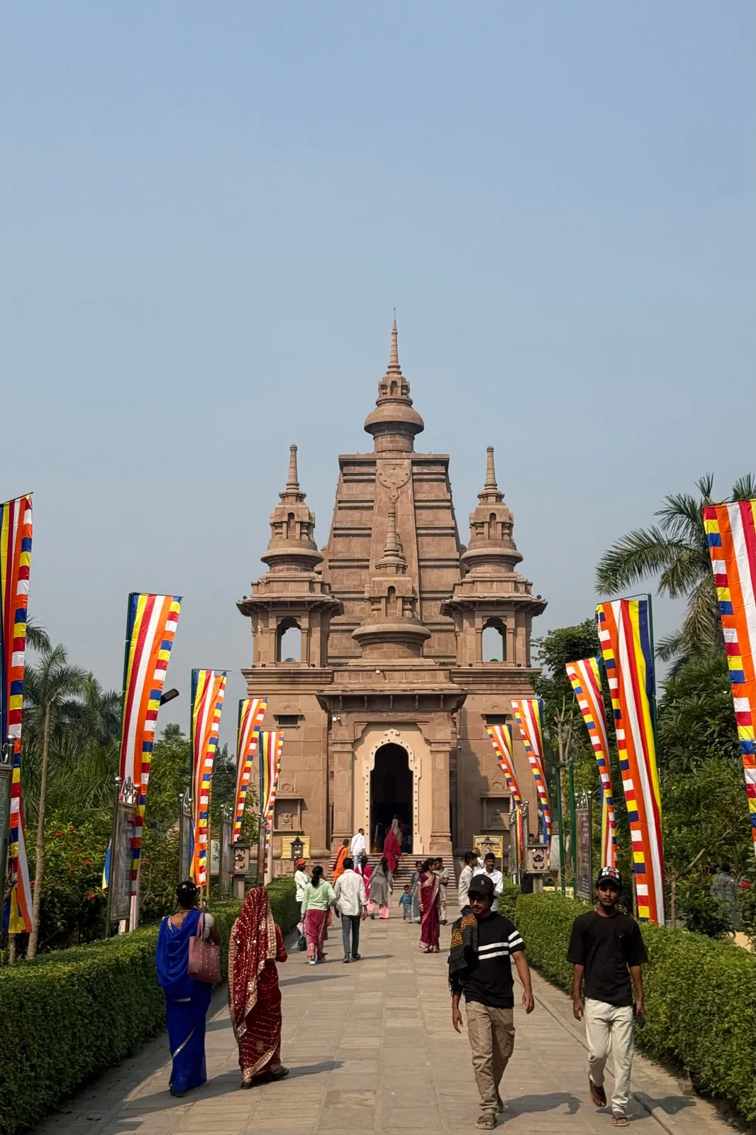 The Dhamek Stupa at Sarnath near Varanasi surrounded by green lawns